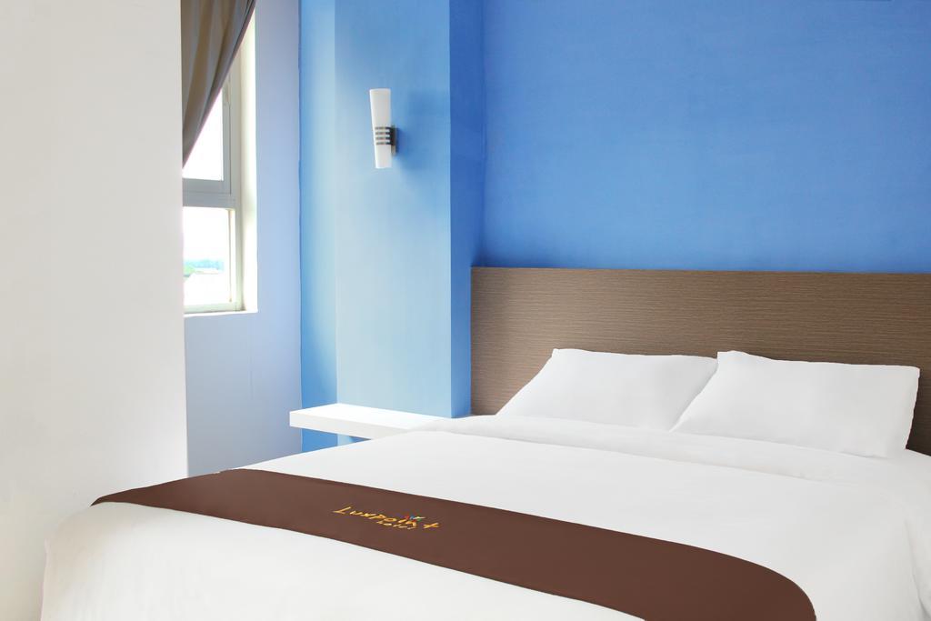 Luxpoint Hotel Baratajaya Surabaya Bilik gambar
